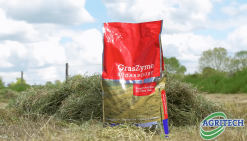 GrasZyme Sugarboost bag in a field of cut silage